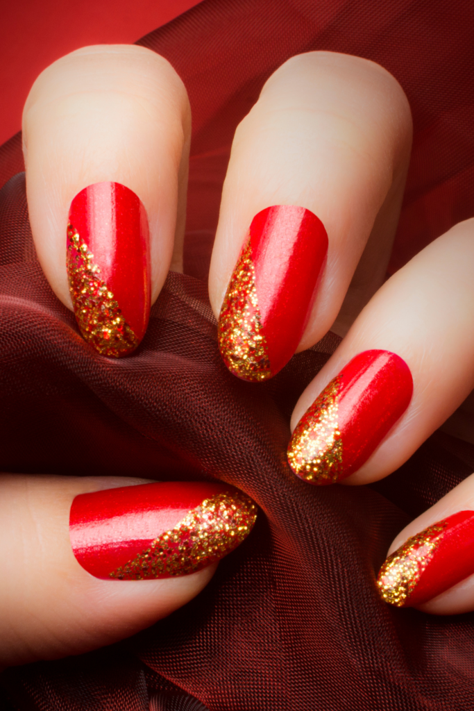 red and gold glitter holiday nails