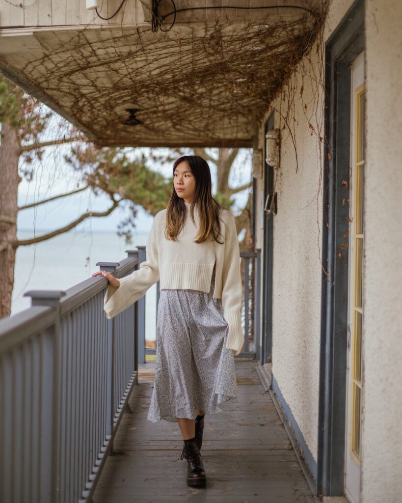 Woman Walking Near Railing