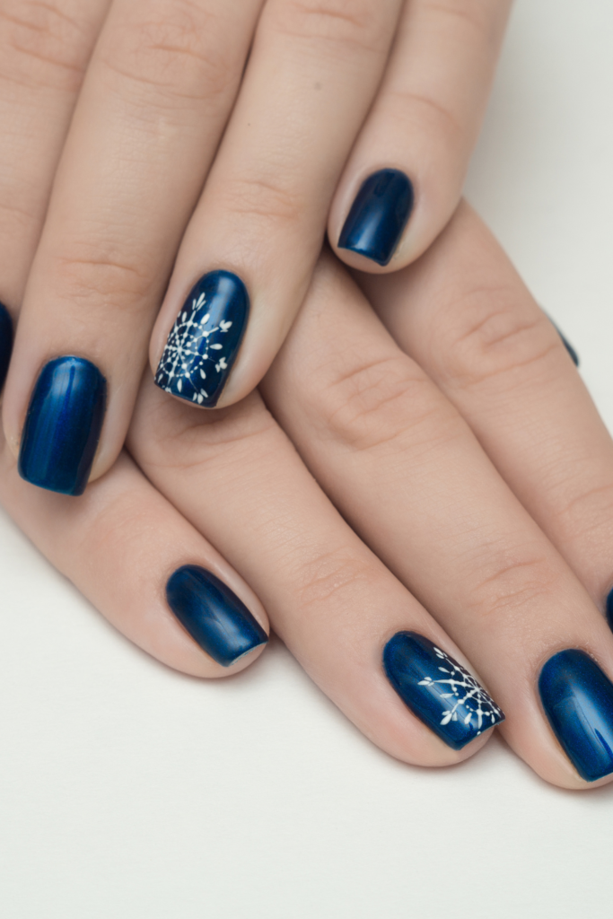 blue snowflake nail art 