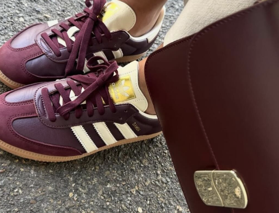 close up of deep wine adidas and matching handbag