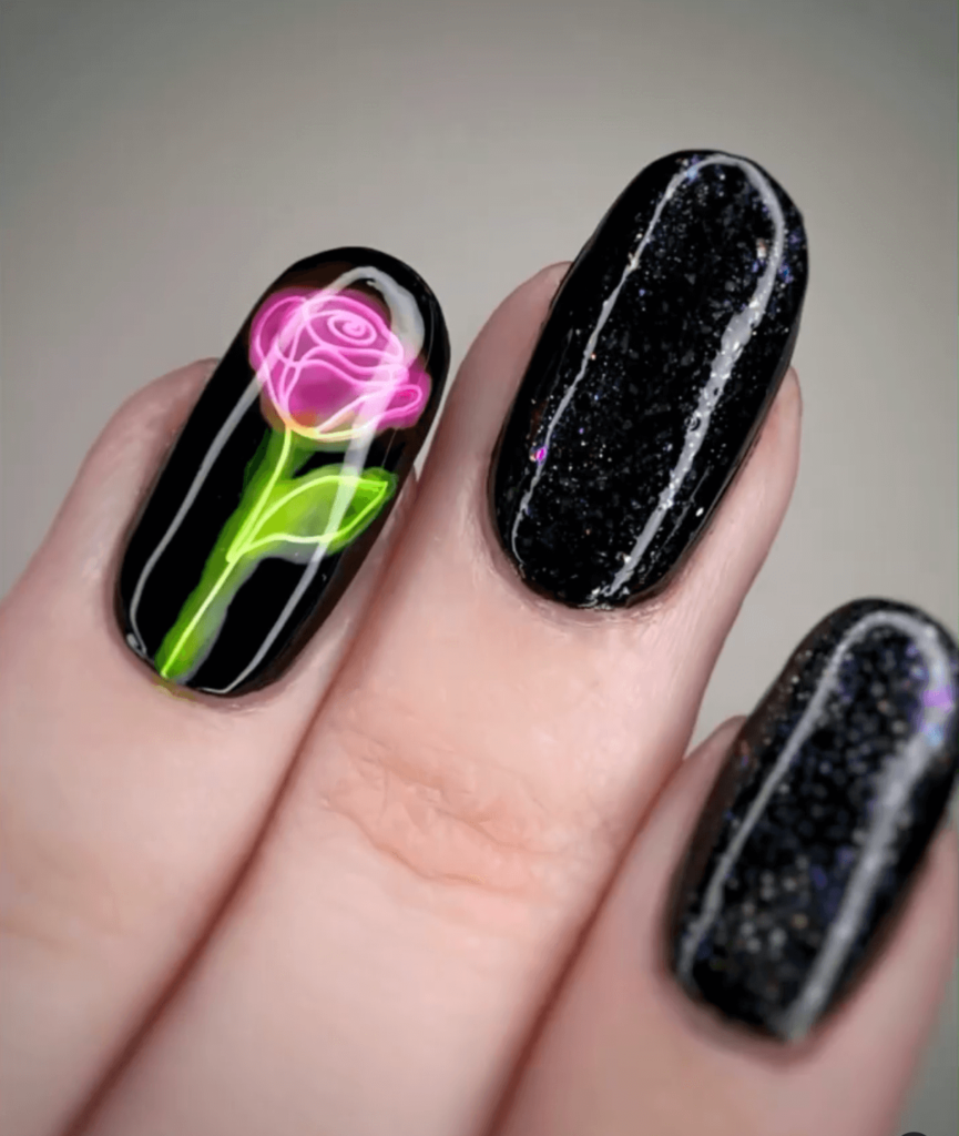 neon rose nail art design against black nail polish