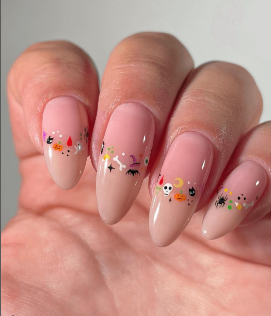 minimalist and tiny Halloween motif nail design