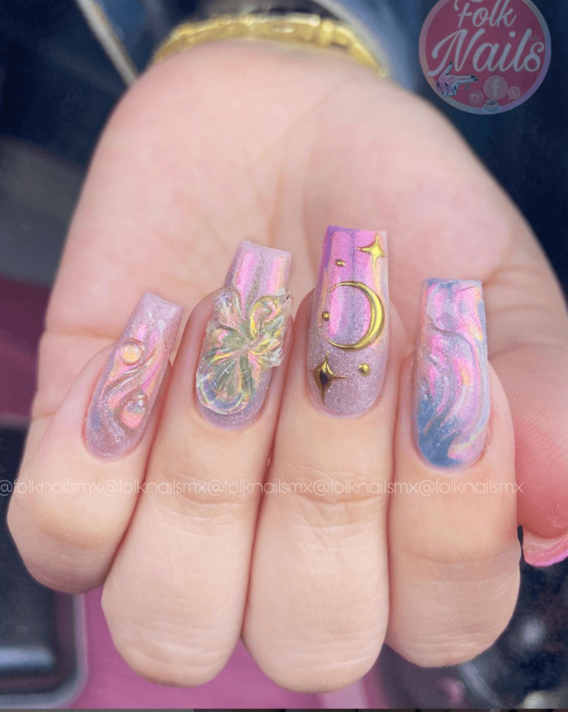 pink and purple holographic nail design with celestial 3D art