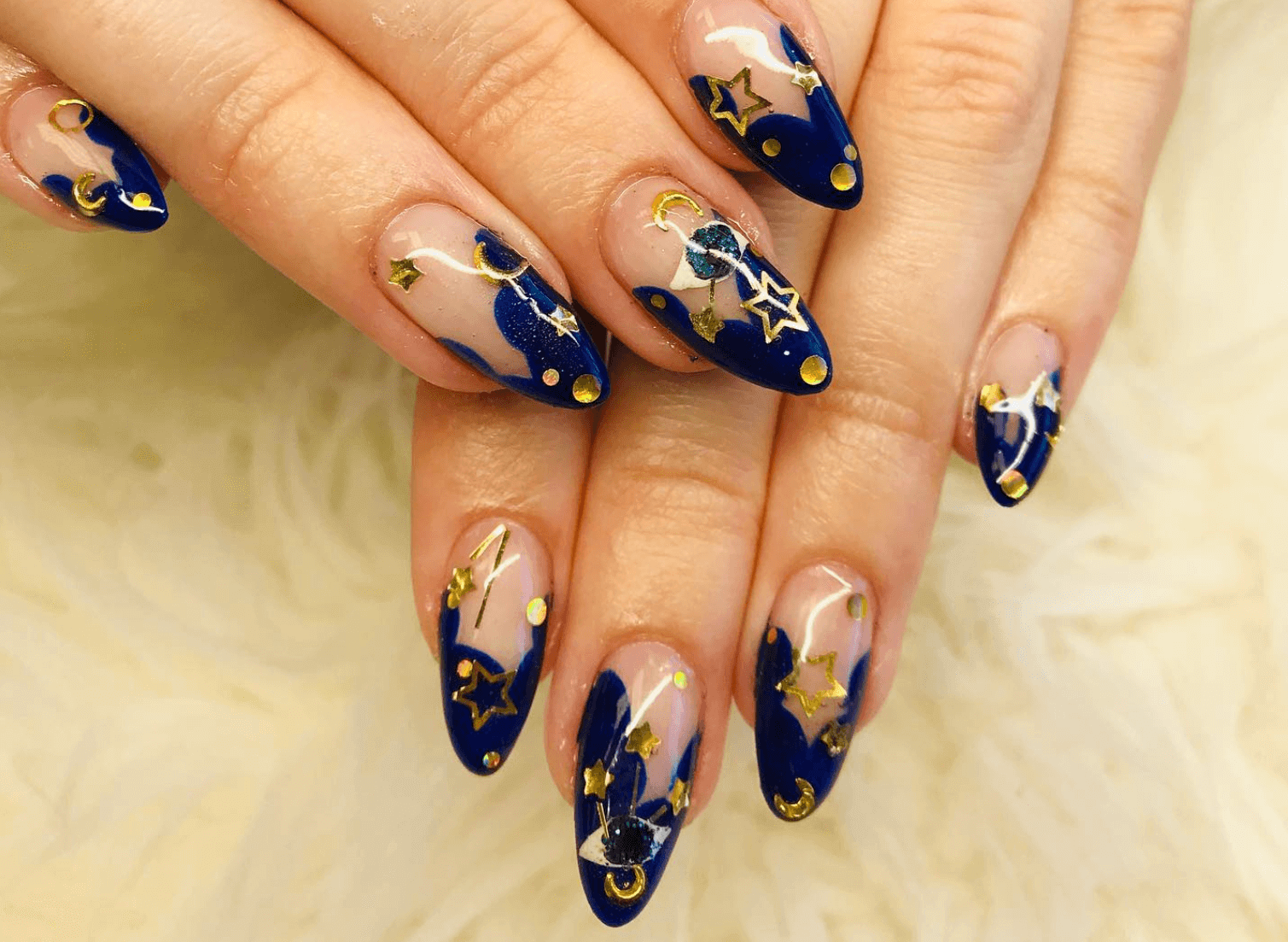 elegant Halloween nail art featuring midnight sky