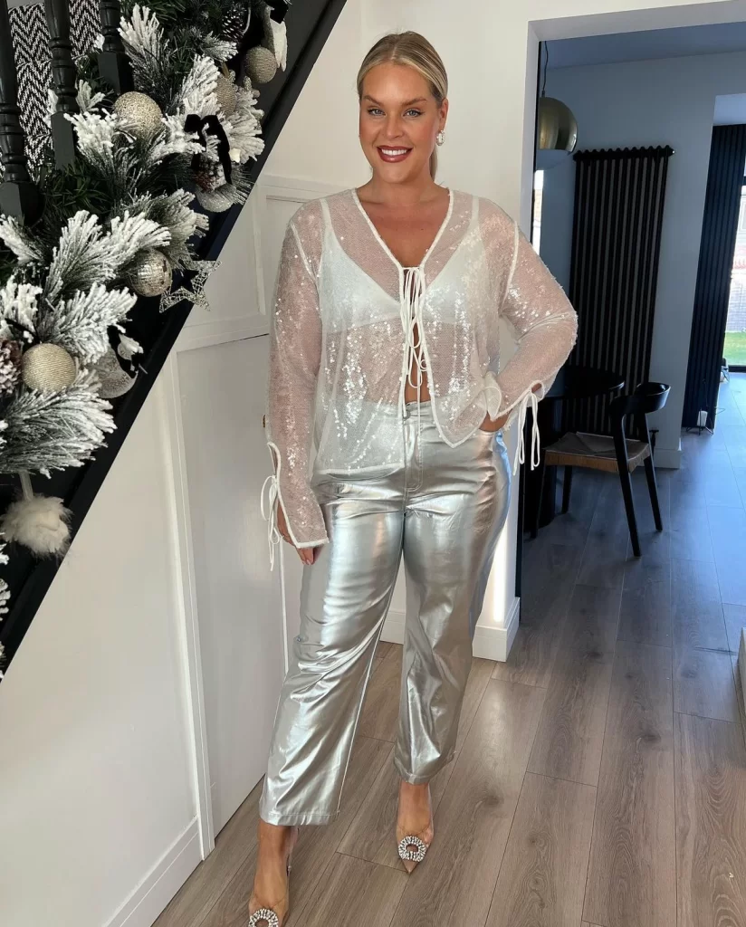 Christmas dinner outfit with silver pants, and sheer sequin top