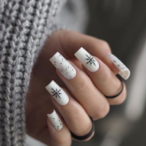 white square long nails with black minimalist winter snowflake design