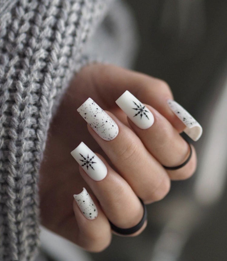 white square long nails with black minimalist winter snowflake design