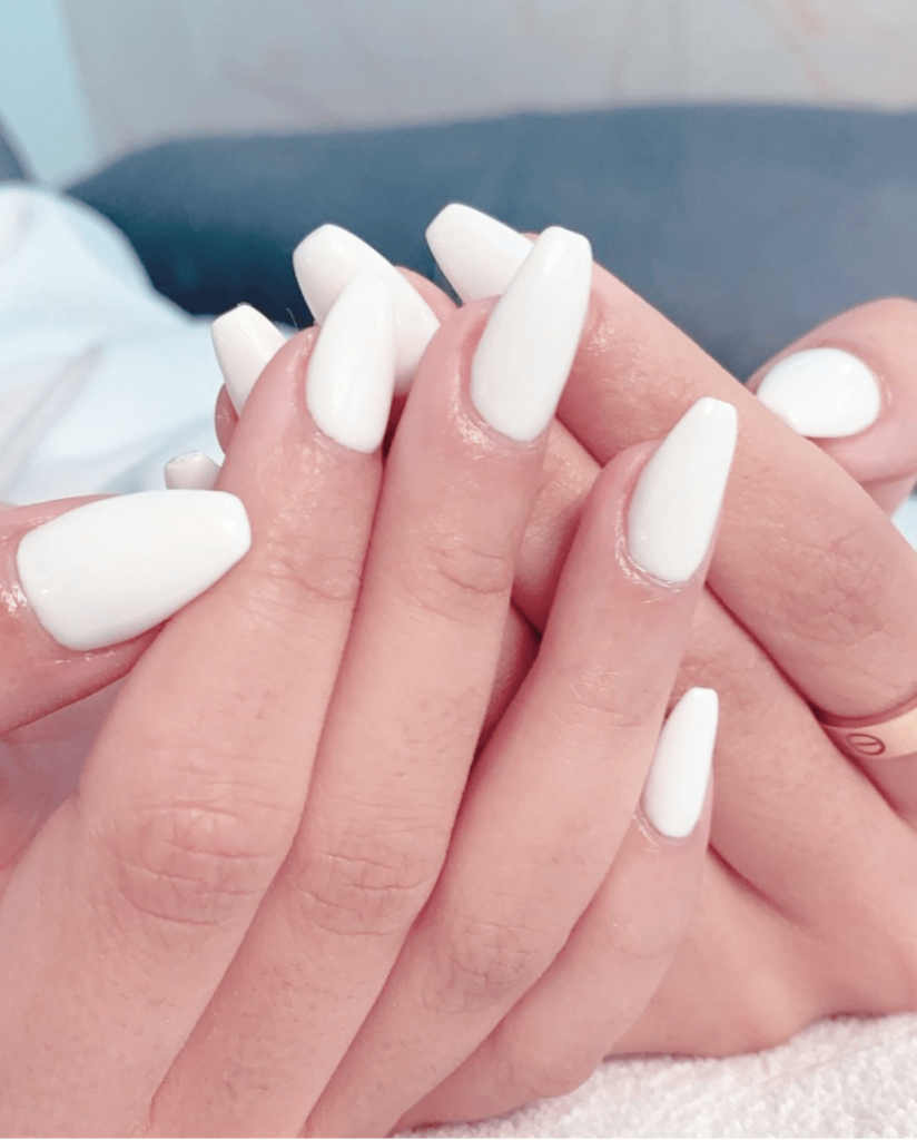 all white manicure on long coffin shaped nails