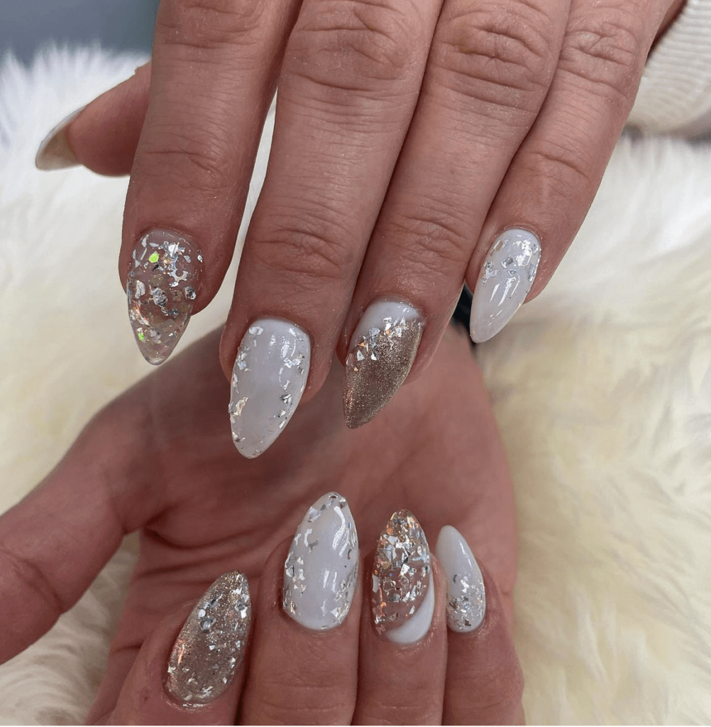 scattered glitter effect on white nails