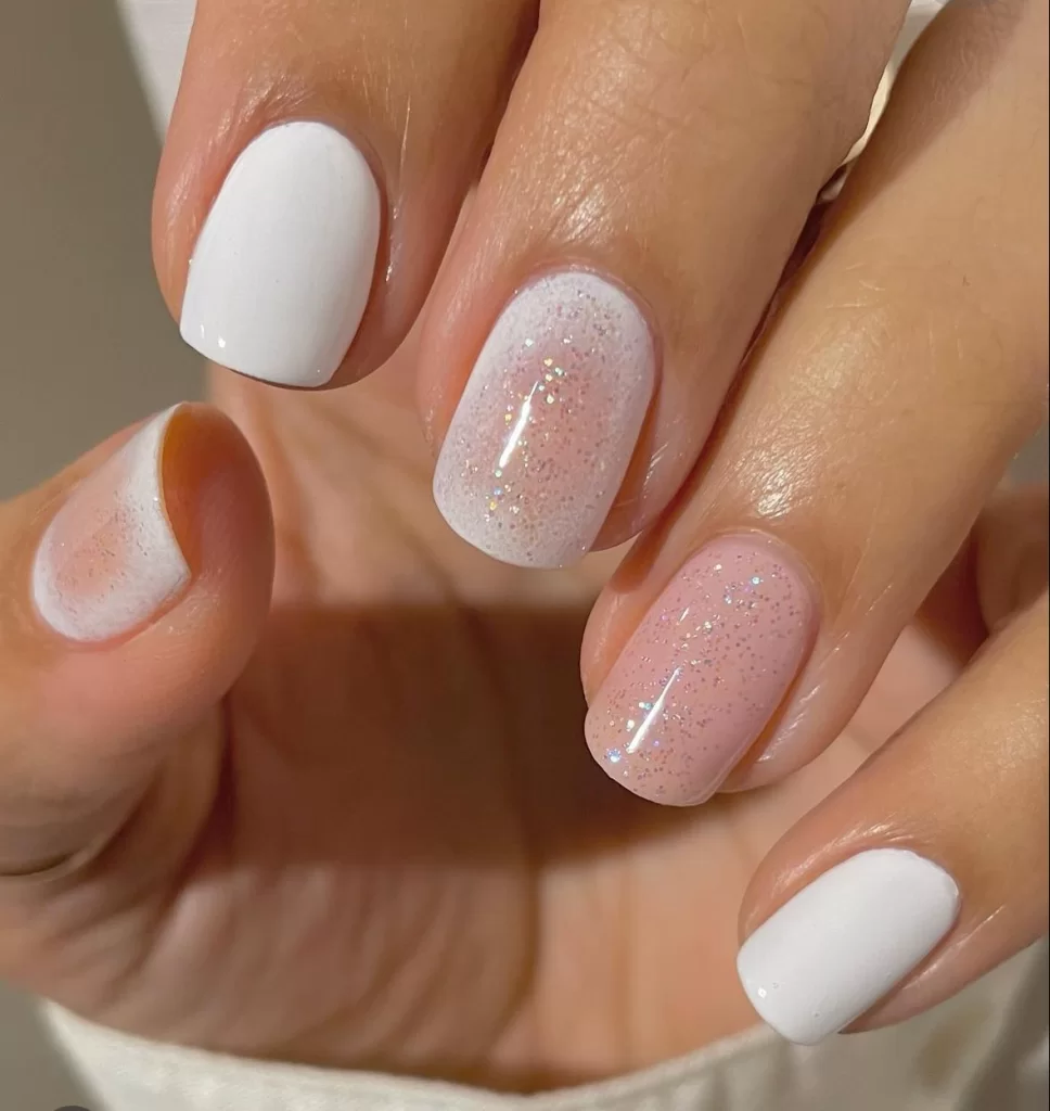 white aura nail art with silver glitter