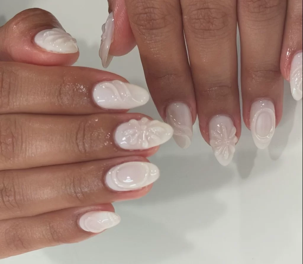 white 3-D nail art manicure