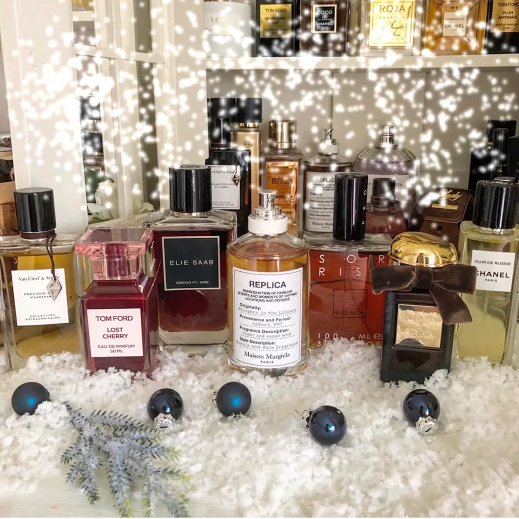 winter perfumes collection with holiday theme decor