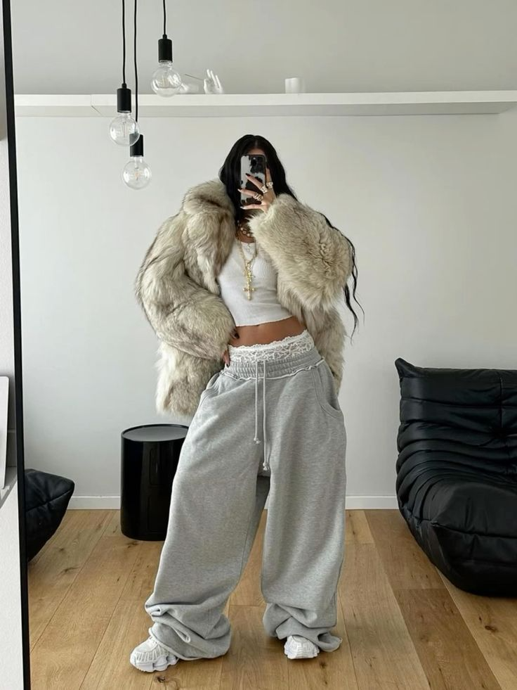 winter baddie sweatpants outfit with cream fur coat