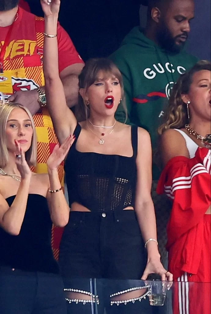 Taylor Swift cheering from stands from NFL superbowl 2024