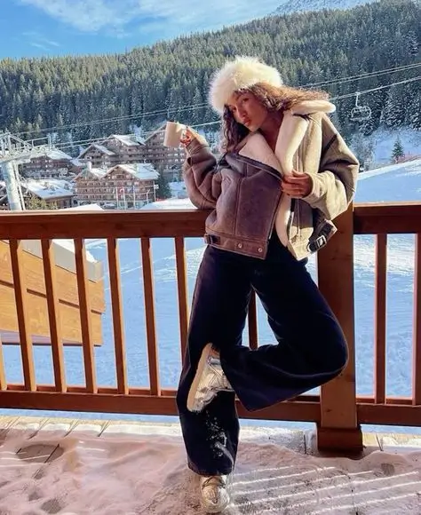 young woman ski trip outfit