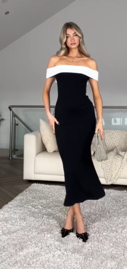 black midi length fitted graduation dress with off the shoulder detail in a white fabric