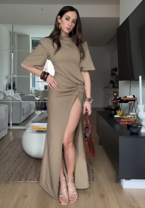 young influencer wearing wearing designer Atoir maxi dress as a graduation party outfit