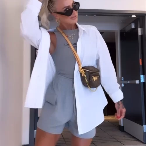 Woman's Amusement Park Outfit picture inspiration with grey knit shorts, grey tank and white button up