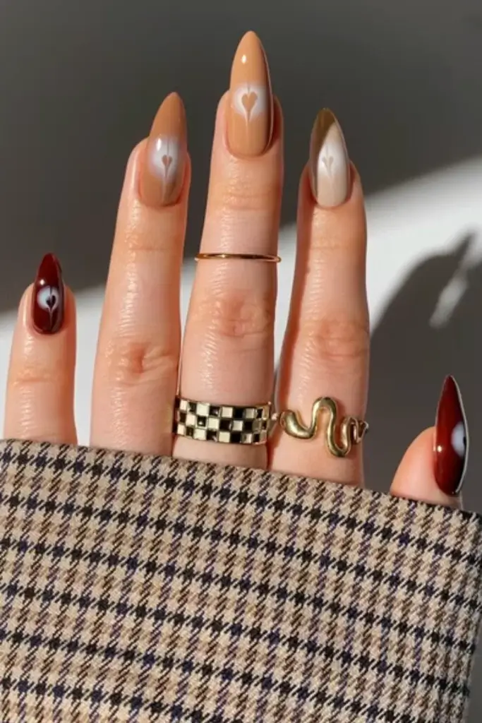 Coffee art inspired Fall nail design done with multiple tones of browns