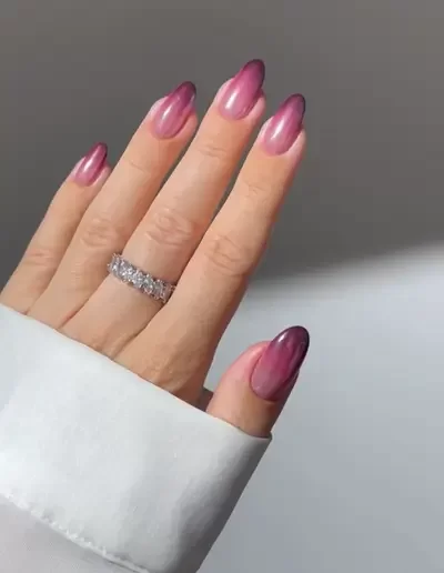 Burgundy ombre nail design with chrome finish