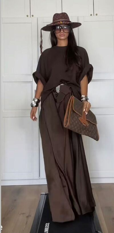 woman wearing monochromatic Fall outfit with a subtle boho aesthetic